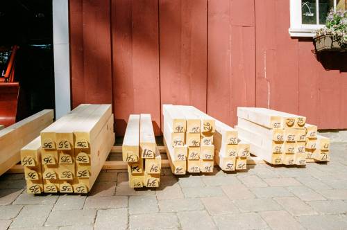 Numbered timbers await their turn