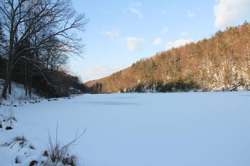 Frozen pond and sunset