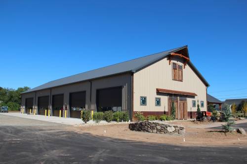 Entrance with garage bays and landscaping