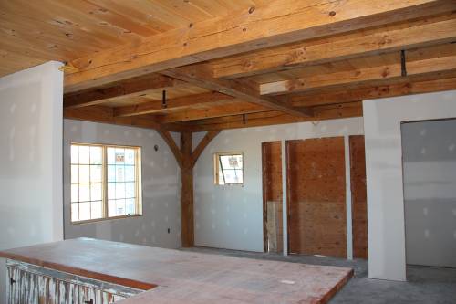 Entrance with rustic timber frame beams