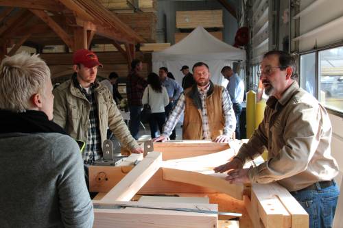 Shop Manager Norm demonstrates how full size timbers are joined to form the frame