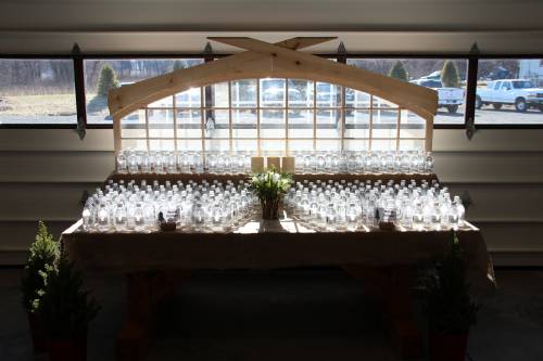 Arched bow top window with water bottles