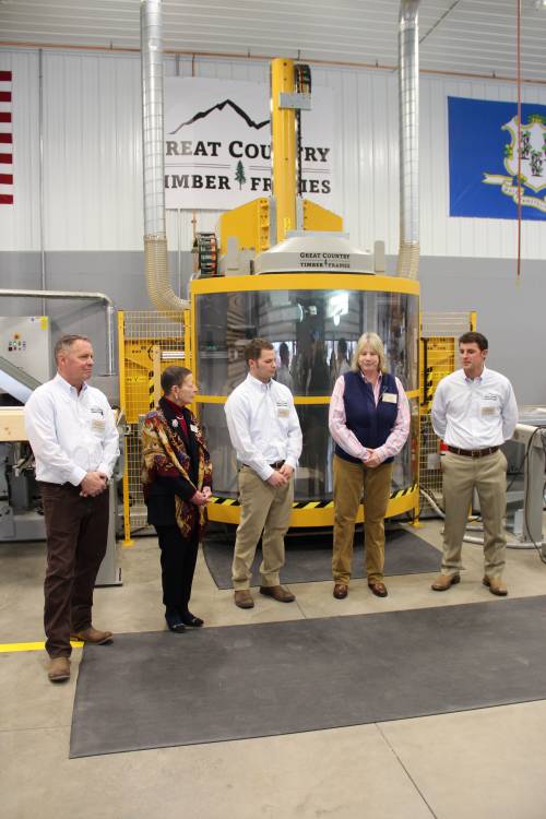 In front of the new CNC machine