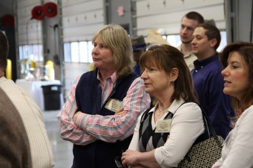Lori Spielman & entourage watch closely