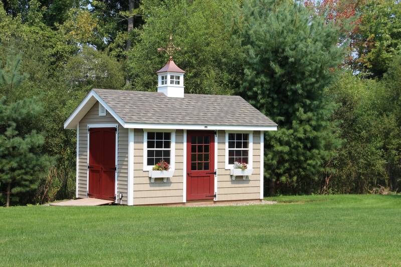 Victorian Cape with Cedar Impressions (on the front wall) and Vinyl Siding