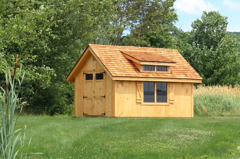 Victorian Cottage with Vertical Pine Siding and Cedar Shake Roofing