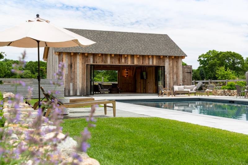 Highly Designed Pool House Integrated into the Landscape