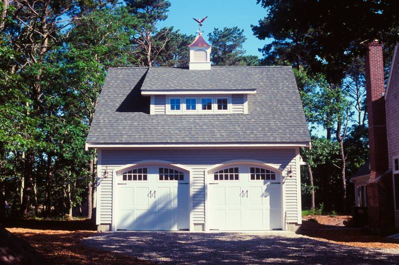 2 overhead doors with arched trim