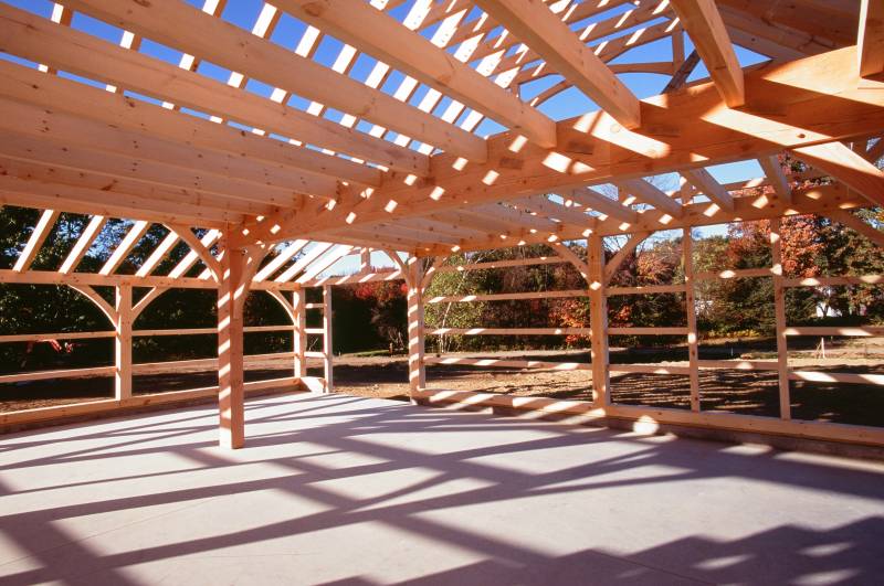 Wide-open spacious interior of the timber frame kit barn