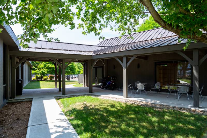 10' x 22' Covered Timber Frame Walkway • 10' x 60' Timber Frame Open Lean-To Roof Overhang