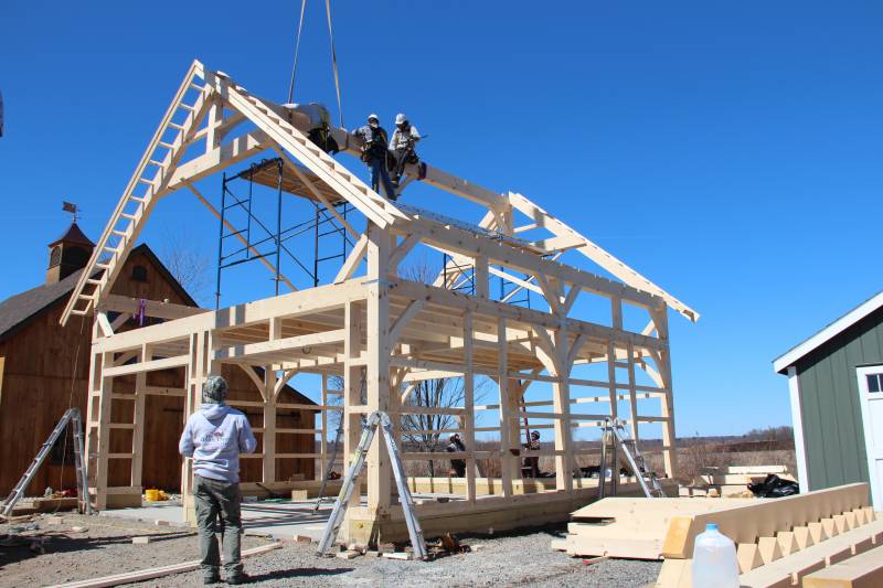 Crew working on the ridge beam