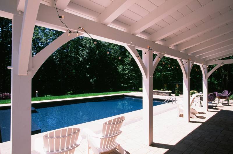 Under the Timber Frame Porch with All Timbers Painted White