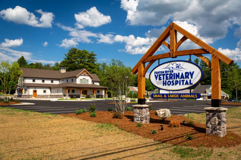 Fenton River Veterinary Hospital Sign Framed by a Timber Truss