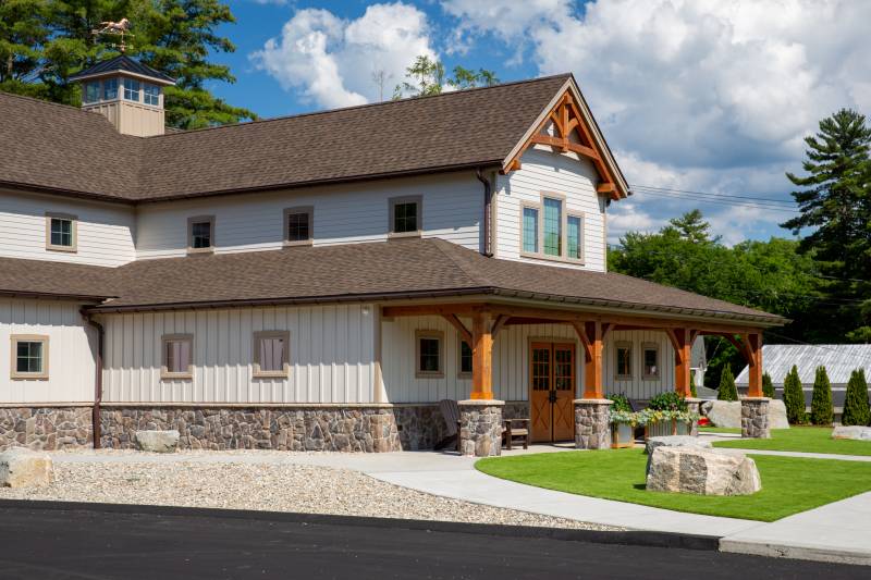 Exterior of the Timber Frame Reception Area • Square Barn Windows •Â Timber Frame Porch