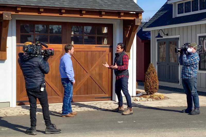 Farmhouse Fixer crew filming Jonathan Knight and Everett Skinner IV at The Barn Yard