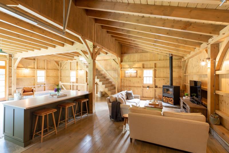 Inside the 12' x 30' enclosed lean-to • Authentic timber framing