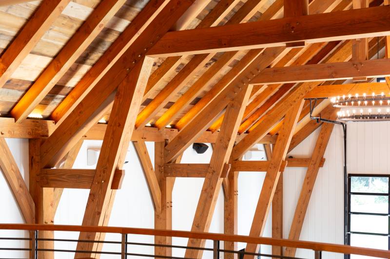 Sling Brace Timber Frame Design • White Shiplap Interior 