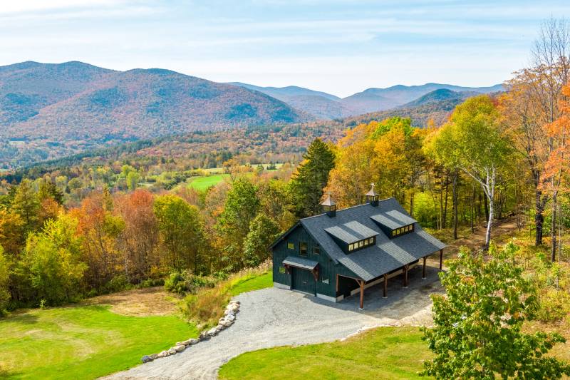 Post and Beam Barn Surrounded by Fall Foliage