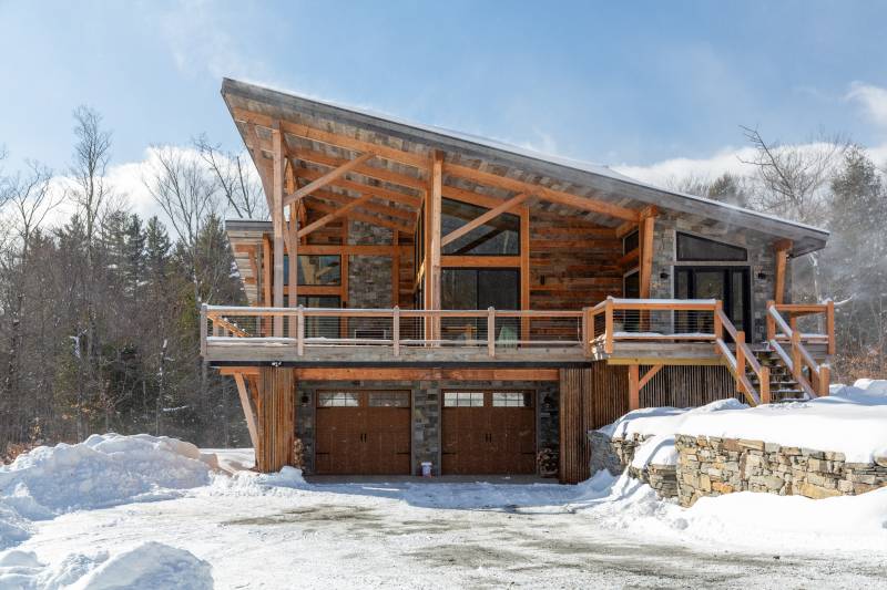 Angled Roof • Drive-Under Garage in Custom Home