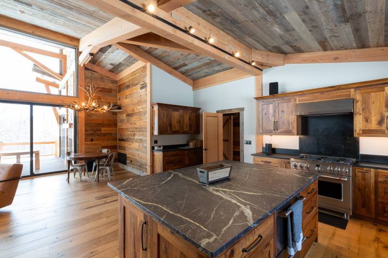 Mountain Modern Timber Frame Home • Kitchen • Keyed Beam