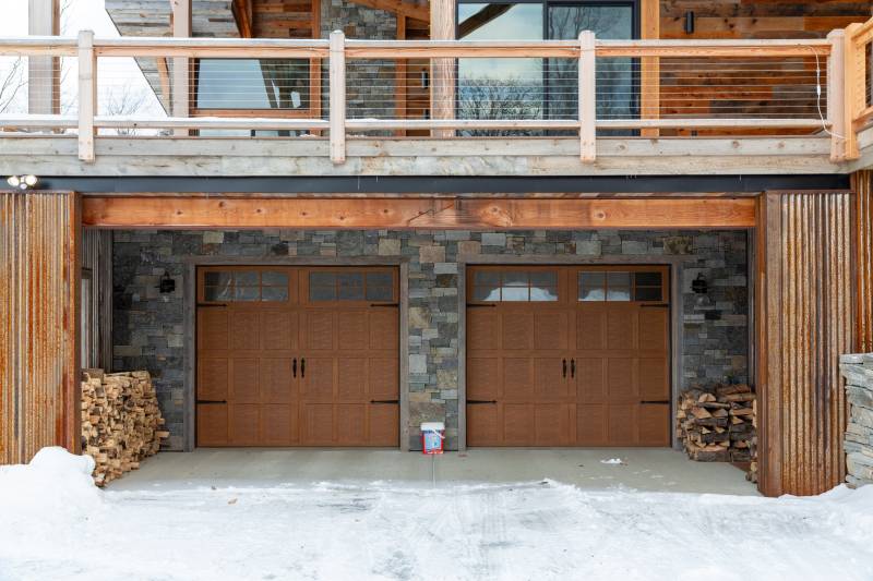 Drive Under Garage • Drive Under Home • Natural Fieldstone • Modern Timber Frame Home