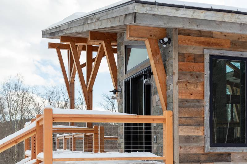 Reclaimed Barn Board Siding • Stainless Steel Cable Railing • Authentic Timber Framing