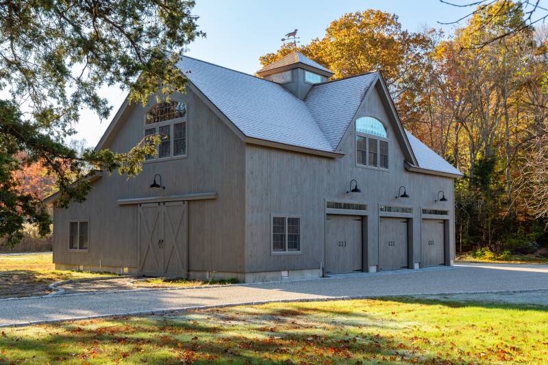 Sliding Barn Doors • 12' x 48' Enclosed Lean-to In the Back