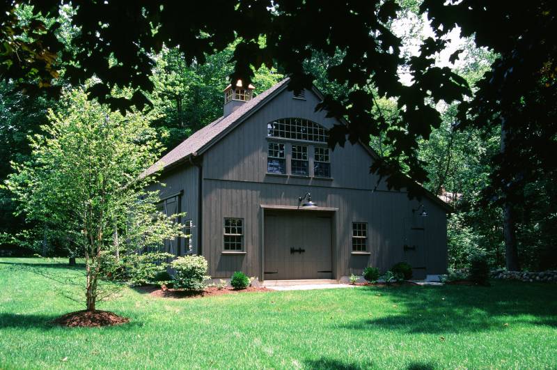 9' x 7'6" Overhead Door • Bow Top Window • Post and Beam Barn