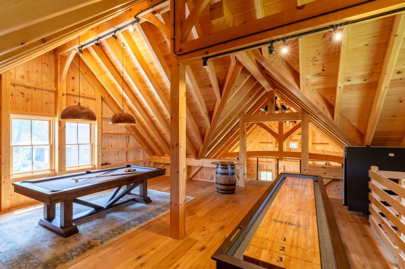 A Reverse Gable Dormer Style Construction Houses the Balcony