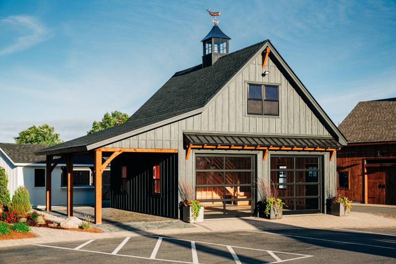 Board and Batten Siding • Timber Frame Accents • Timber Frame Lean-to Overhang