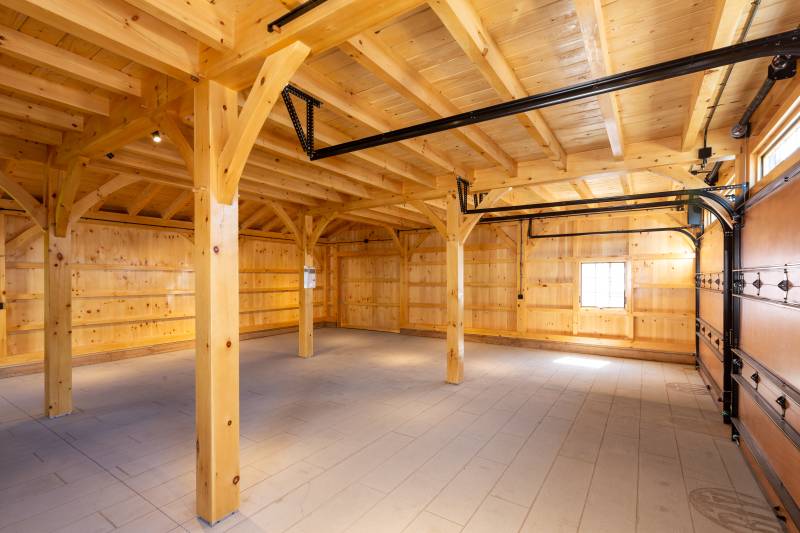 Timber Frame Barn First Floor • Sliding Barn Door in Back