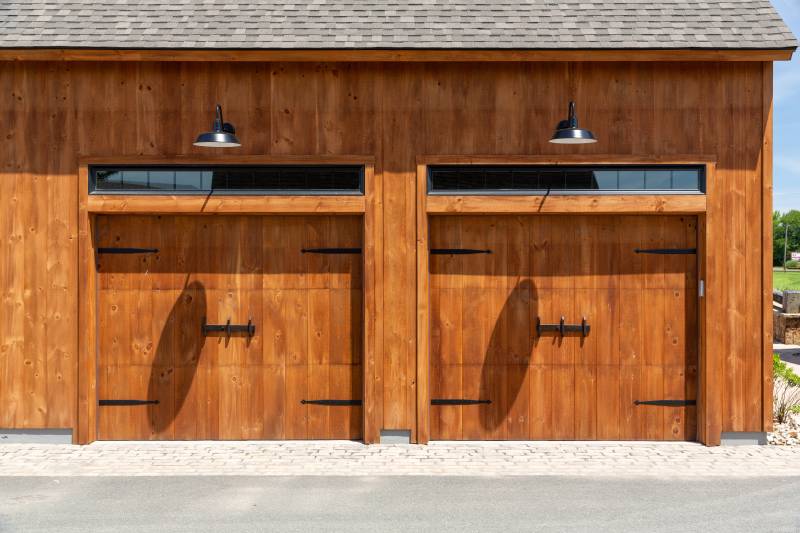 9' x 7' Pine-Faced Overhead Doors • Transom Windows