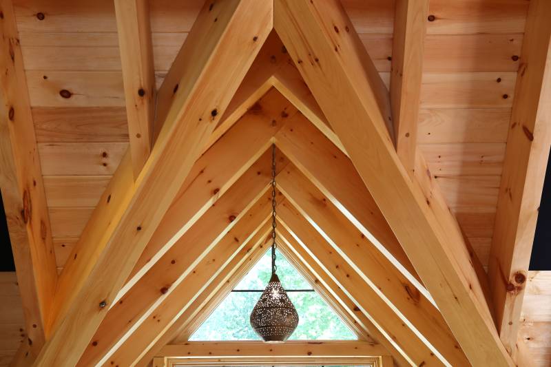 Detailed Joinery Connects the Roof and Dormer Slopes • Timber Framing