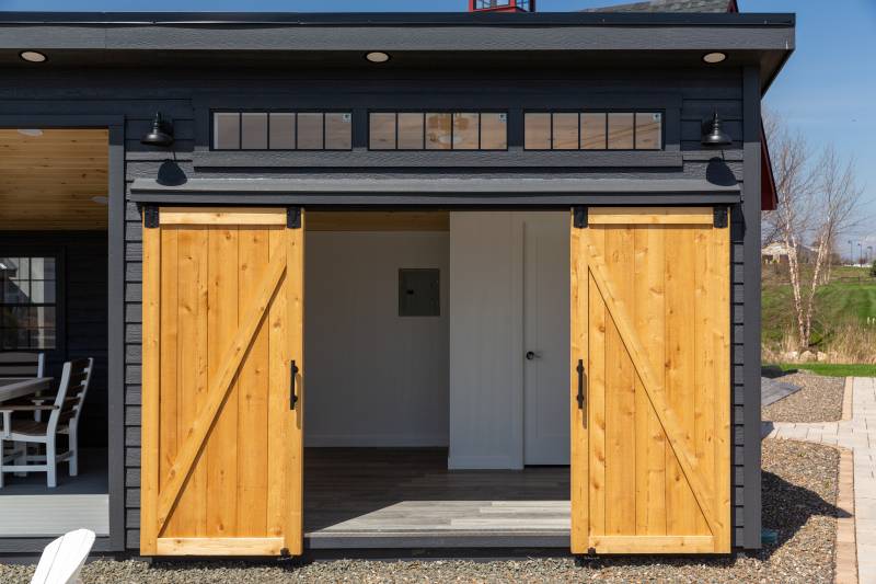 The doors open to reveal a finished interior space