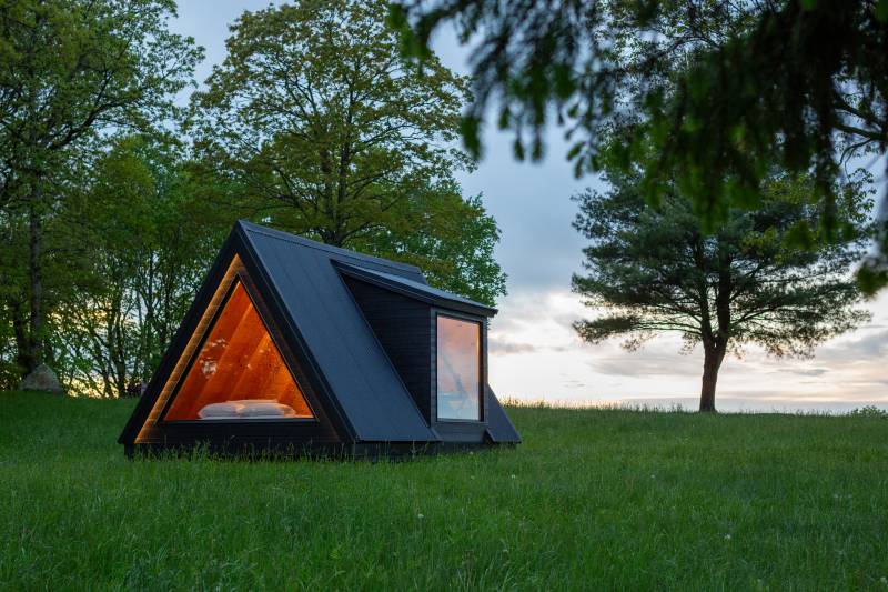 A-Frame Cabin at dusk • Interior Lighting
