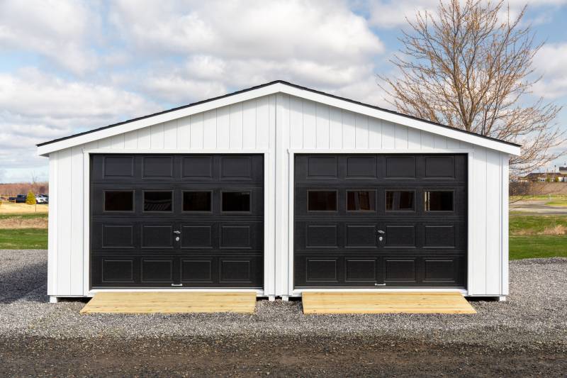 Two 9' x 7' Black Overhead Doors