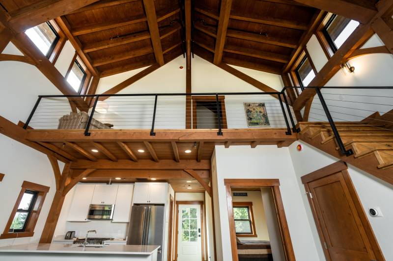 Looking up at the transom dormers & gallery style loft