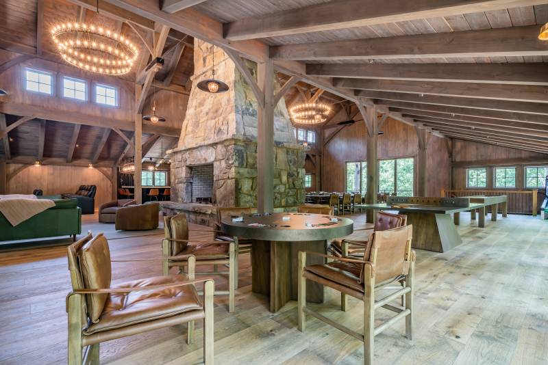 A seating area underneath the event barn’s lean-to