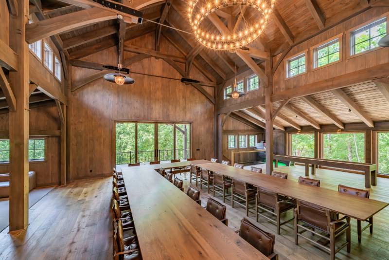 Windows, glass doors, and LED fixtures light up the interior