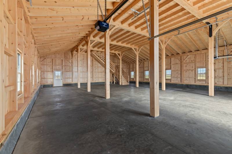 Authentic mortise & tenon post & beam construction throughout the timber frame barn