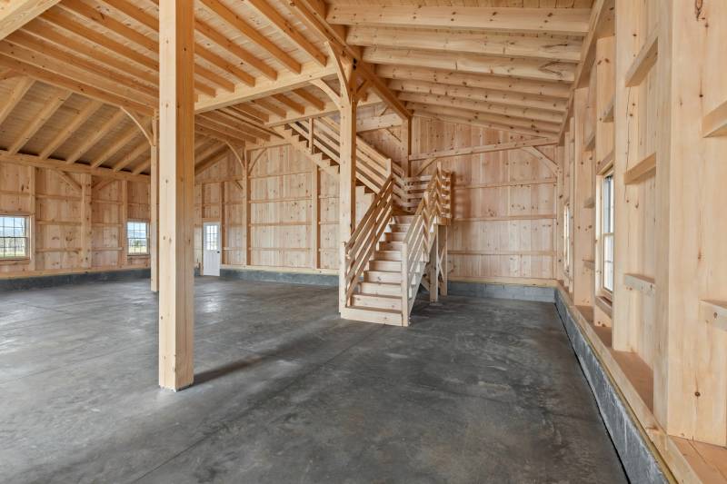 The stairs to the timber frame barn’s second floor loft • monitor barn western barn