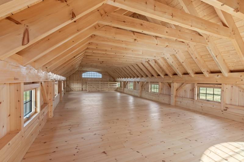 The 20' x 54' second floor loft is spacious and versatile • post & beam timber frame