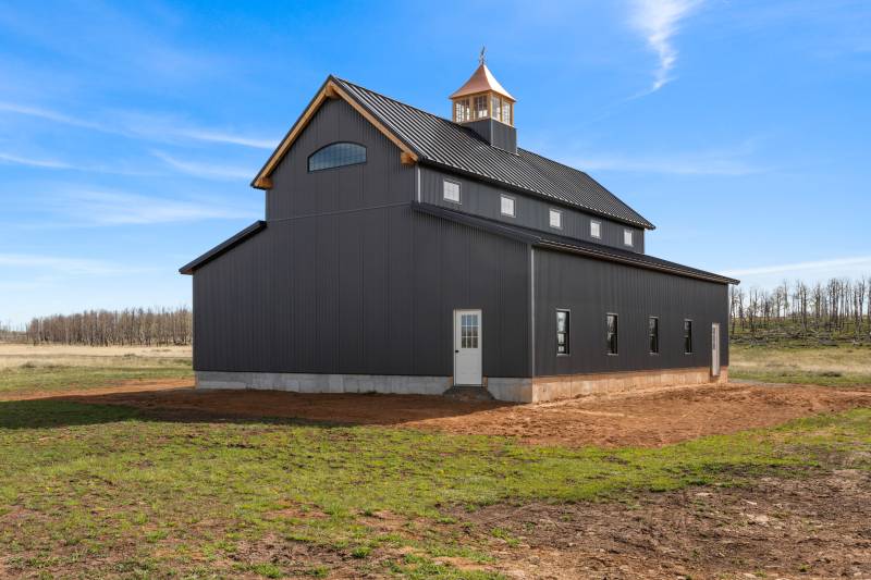 Post & Beam Monitor Barn with timber show rafter on gable
