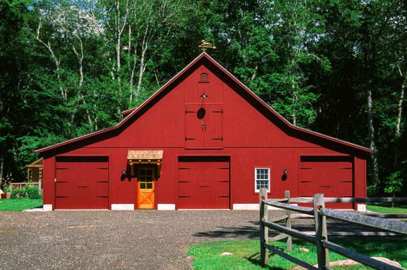 30' x 48' main barn with two 12' x 48' enclosed lean-tos • post & beam barn timber frame barn