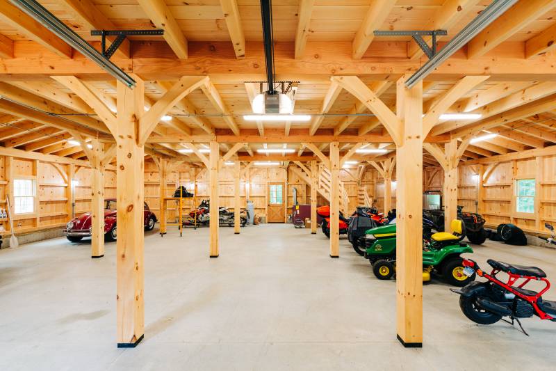 Post & beam barn interior • Two enclosed lean-tos provide extra space