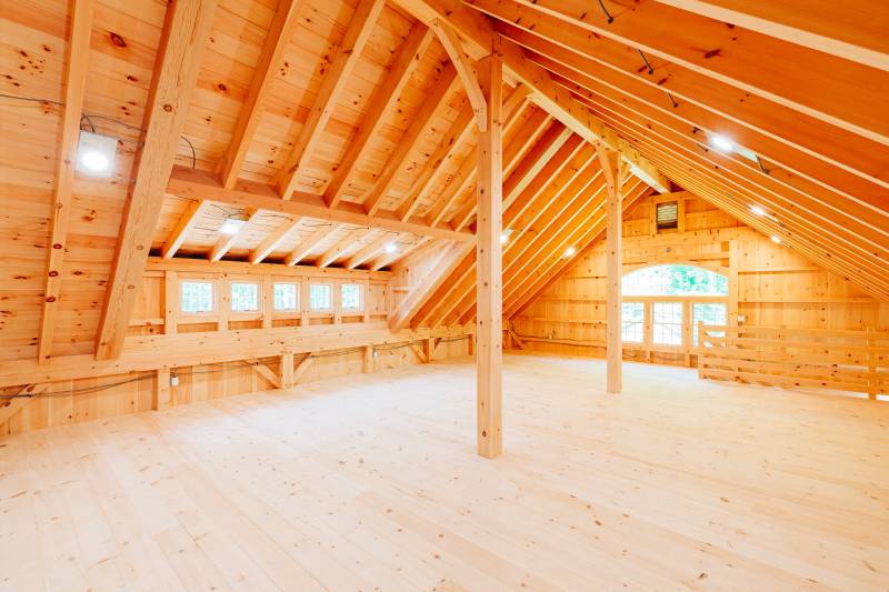 54' x 48' Hamilton Carriage Barn second floor loft interior • post & beam barn