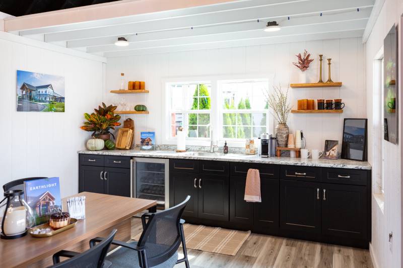 Live Off-the-Grid in this Solar Powered Cabin • Kitchen and Dining Area
