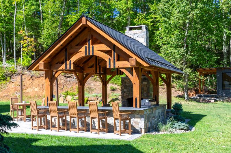 Hammer Beam Trusses with Powder Coated Steel Strapping • timber frame pavilion