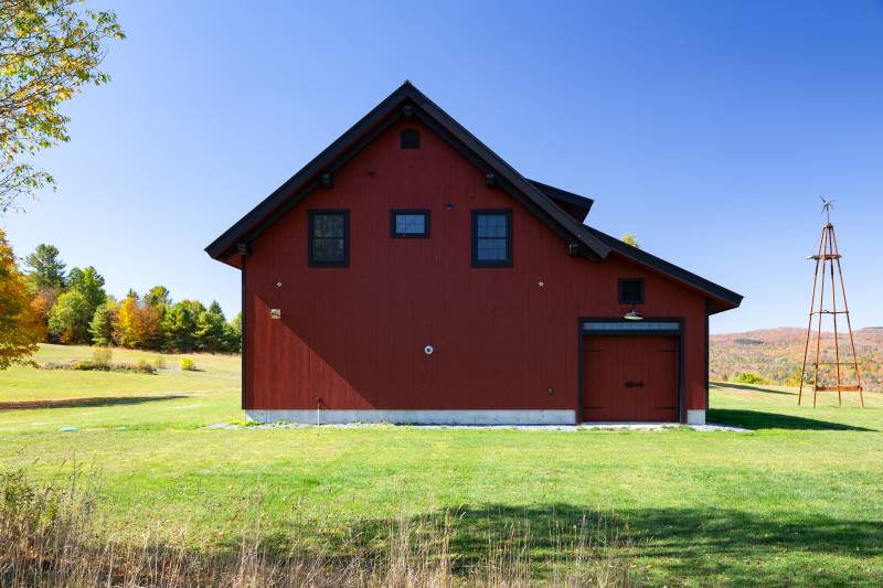1x10 Premium Kiln Dried Pine Shiplap Siding, painted red