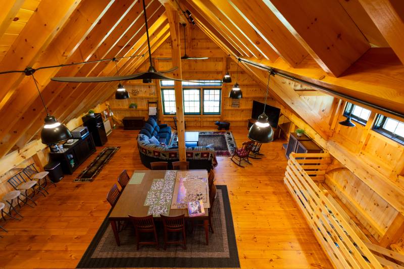Looking down at the living space from the loft bedroom